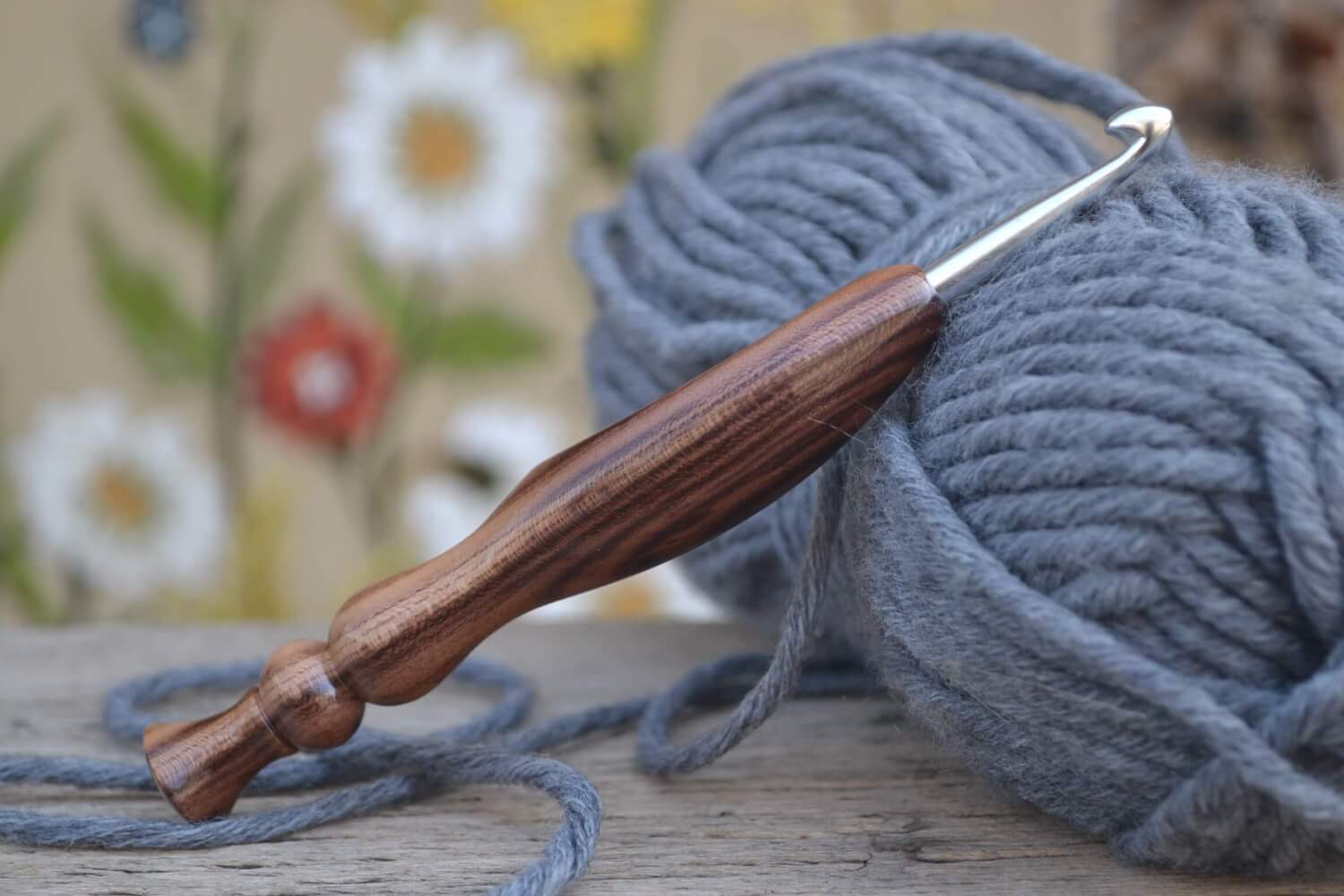 Handmade crochet hook, dark apricot wood handle, ergonomic thumb rest, KnitPro metal tip.